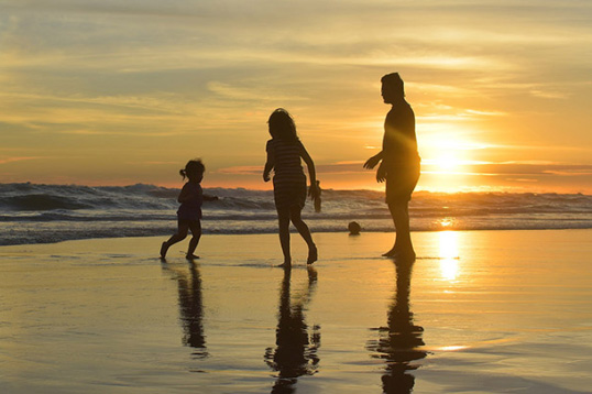 family sunset walk